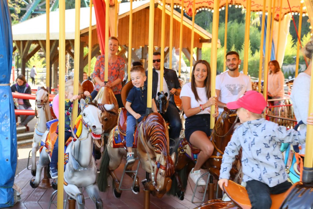 The carousel of wooden horses.